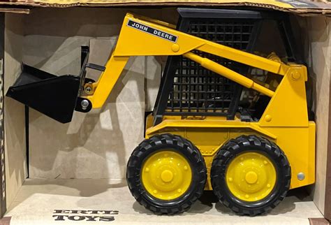 1 16 ertl john deere skid steer tracks|Ertl 1:16 John Deere Diecast Construction Equipment.